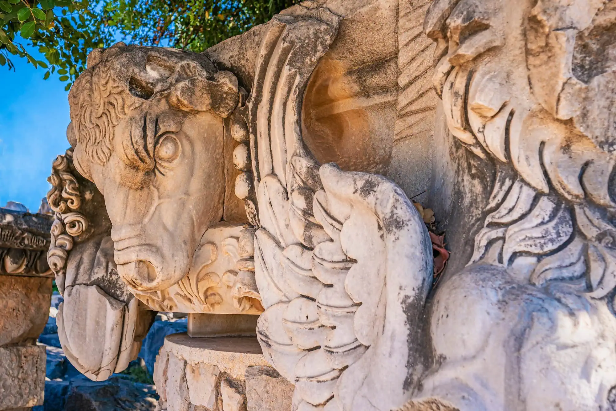 Ancient stone bull sculpture carved in relief at Didyma sanctuary, Turkey