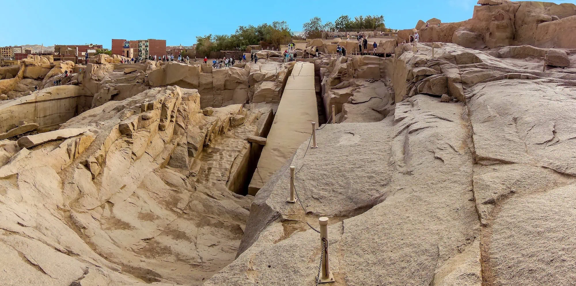 Panoramic view of the Unfinished Obelisk lying in its granite quarry with surrounding rock walls, Aswan