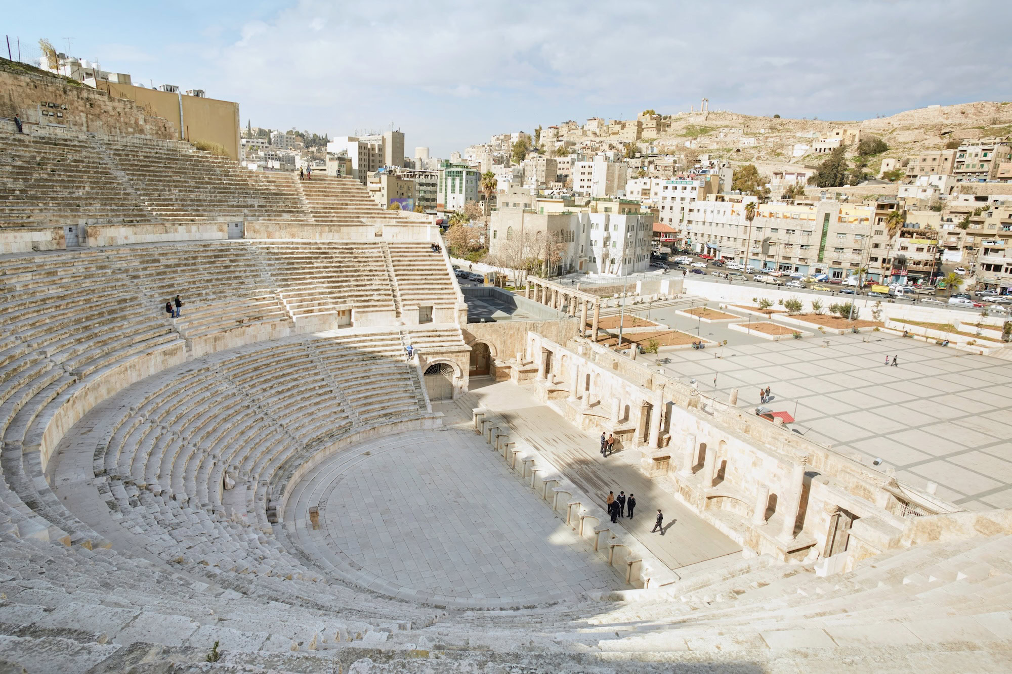 Ancient Roman Theatre in Amman with stone amphitheater, columns and ruins