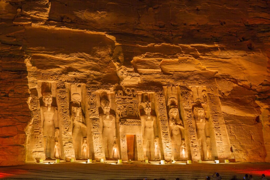 Abu Simbel temple at sunset night sky lighting illumination. UNESCO World Heritage Site Aswan Egypt.