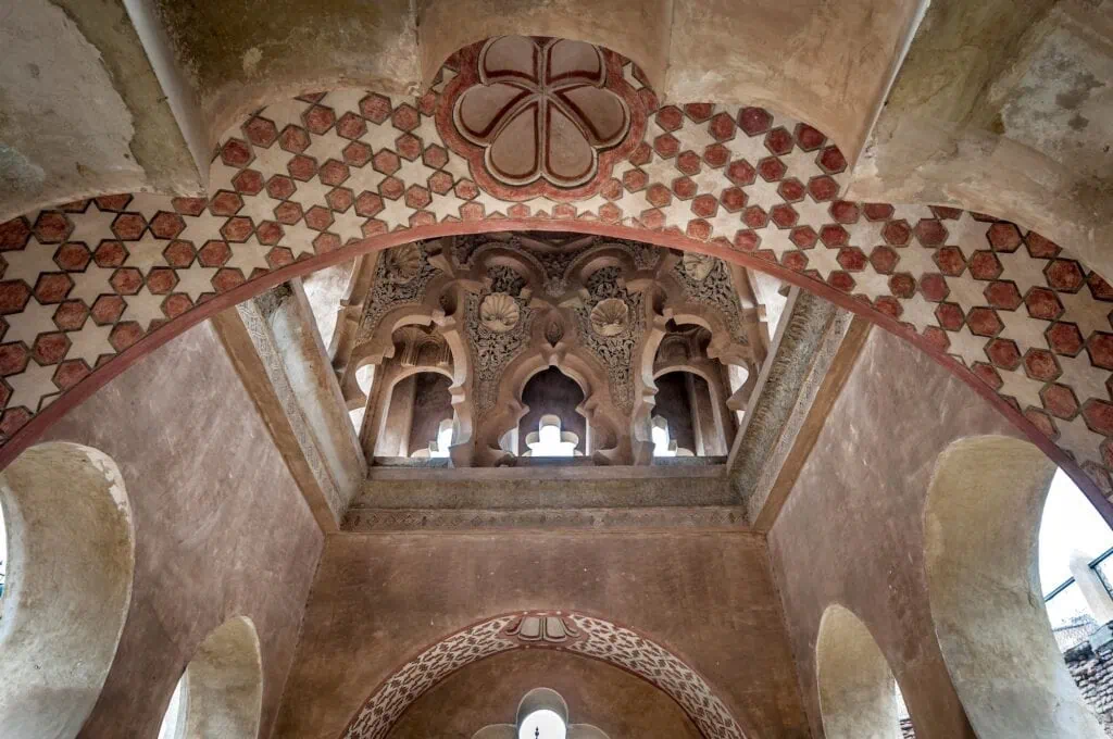 Almoravid Koubba pavilion with carved stone arches and domed roof near Marrakech Museum, Marrakesh