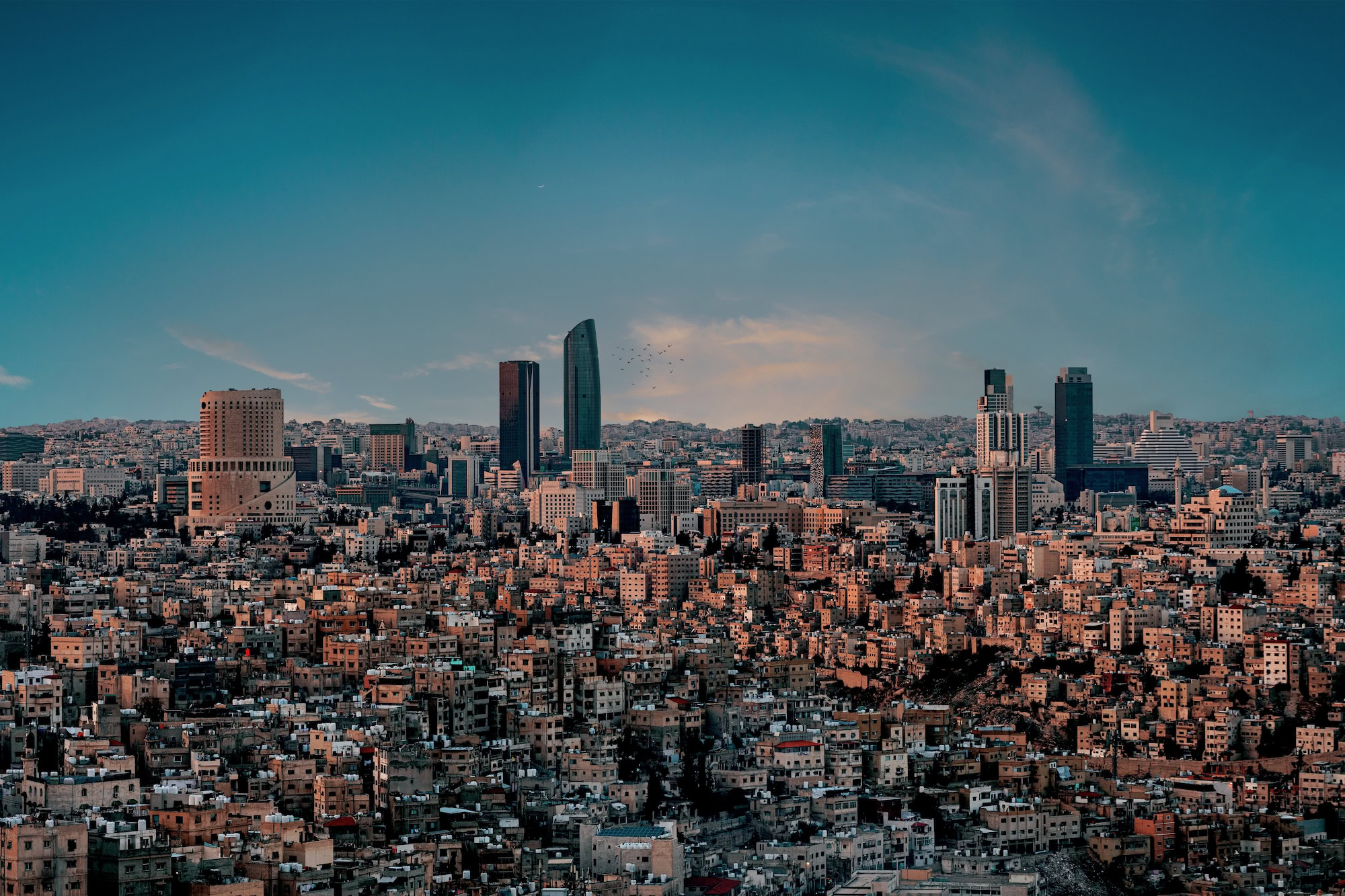 Amman cityscape showing urban sprawl and modern development across hills