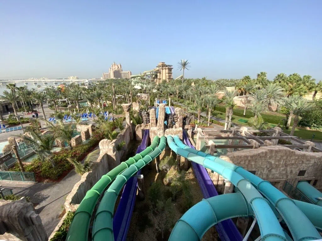 Aquaventure Waterpark at Atlantis The Palm showing multiple water slides, pools, and winding river rides on Palm Jumeirah island, Dubai