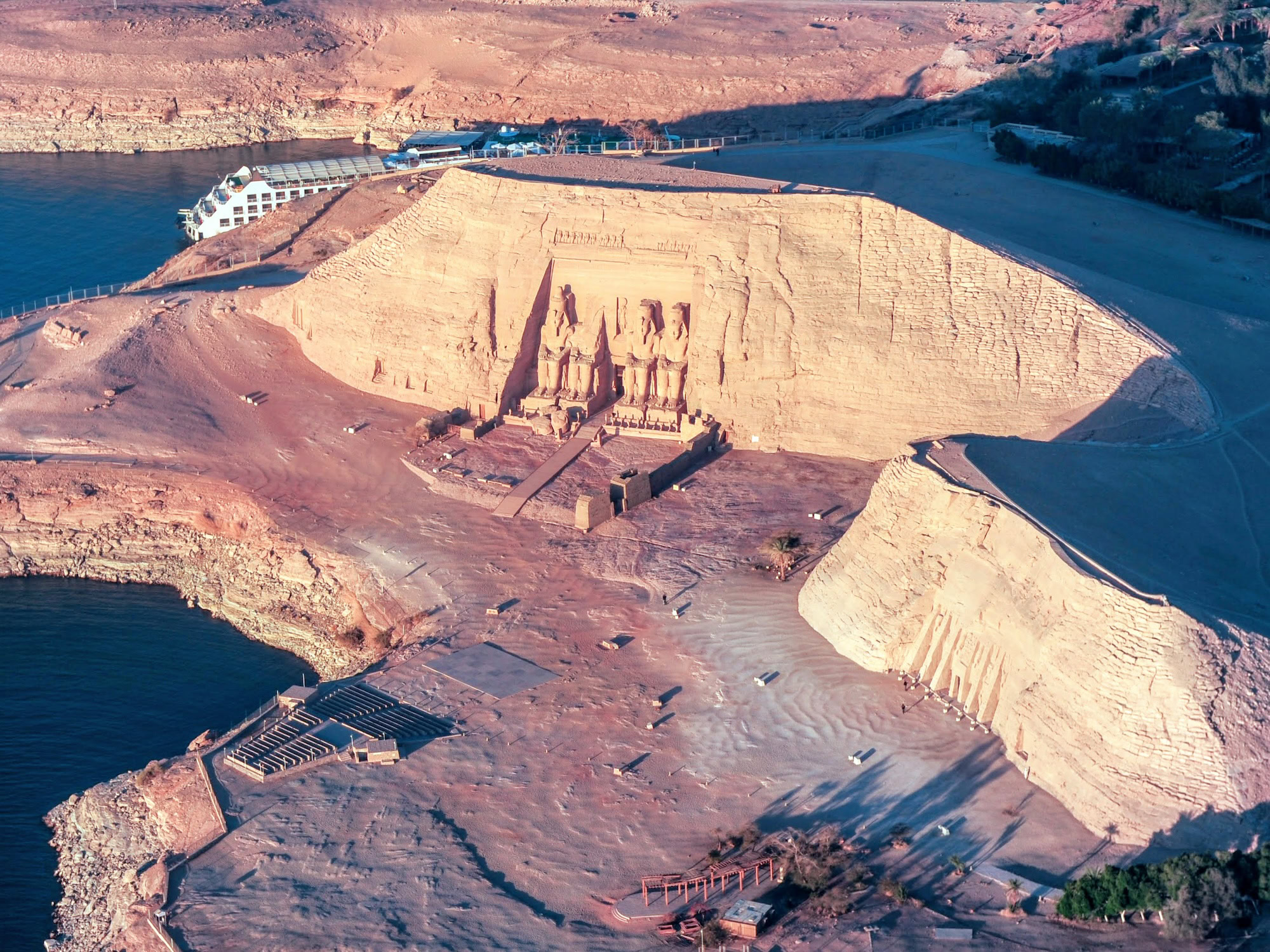 Aerial view of Abu Simbel temple complex beside Lake Nasser showing relocated ancient temples