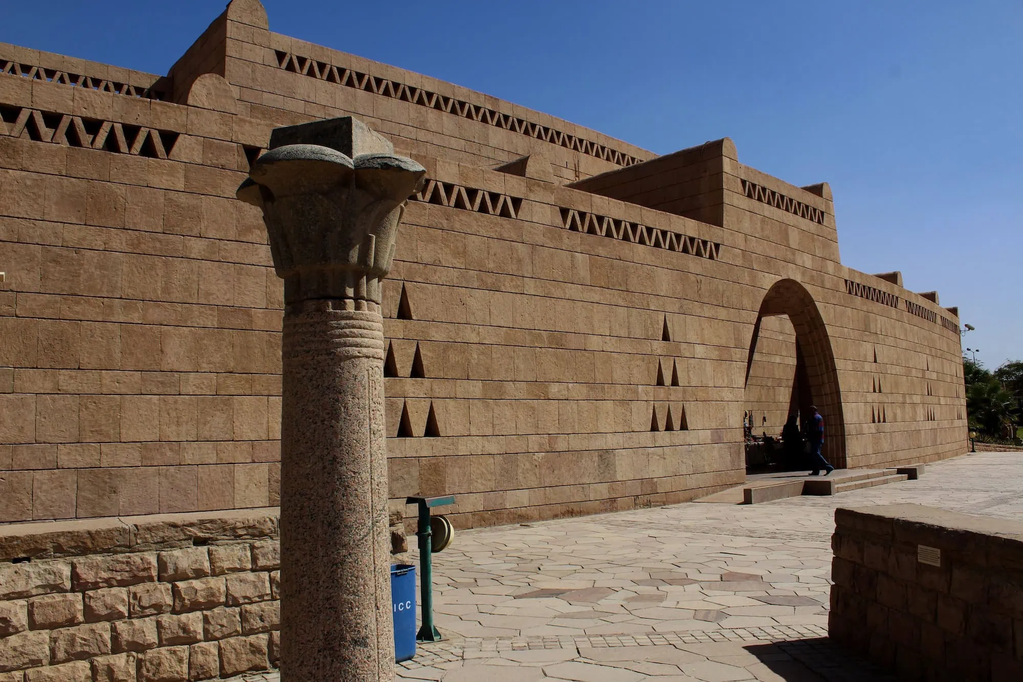 Exterior view of the Nubian Museum in Aswan showing modern sandstone architecture