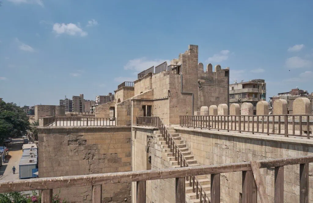 Bab al-Futuh stone gate with twin round towers forming part of the historic city wall, Bab al-Futuh, Cairo