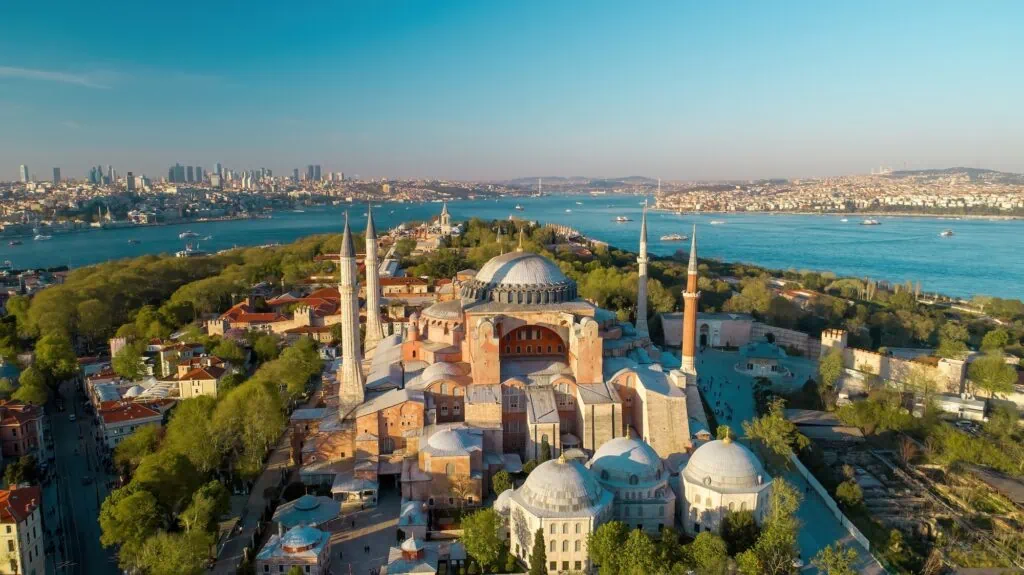 Aerial view of Hagia Sophia in Istanbul, Turkey — the 6th-century Byzantine basilica with its central dome and four Ottoman-era minarets, originally built in 537 AD under Emperor Justinian
