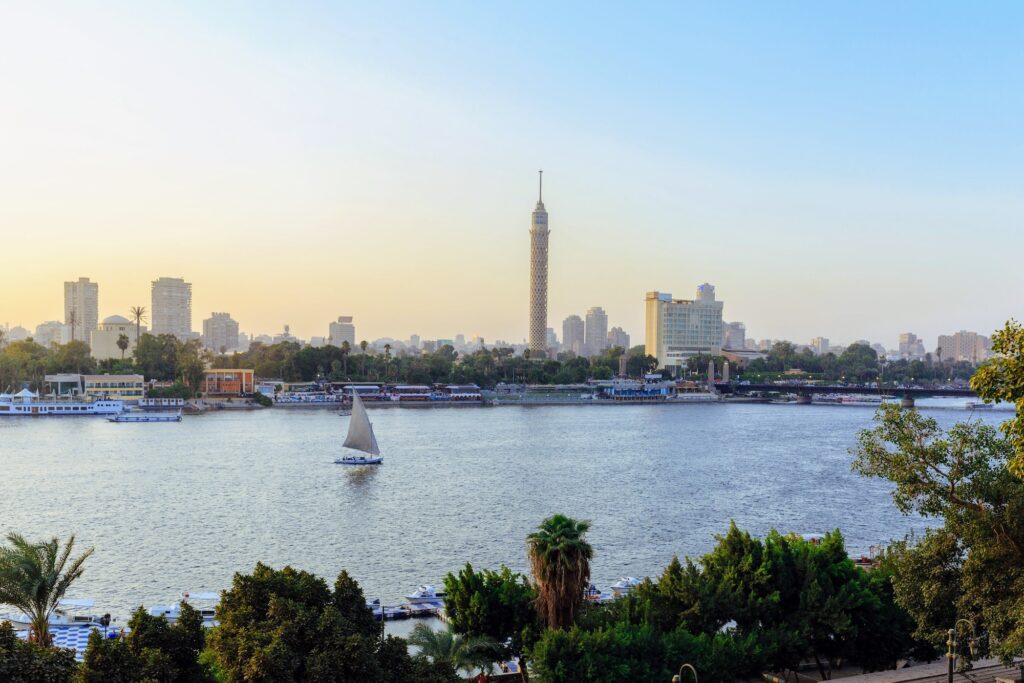 View of the Nile River with Cairo Tower and surrounding city skyline along the riverbank
