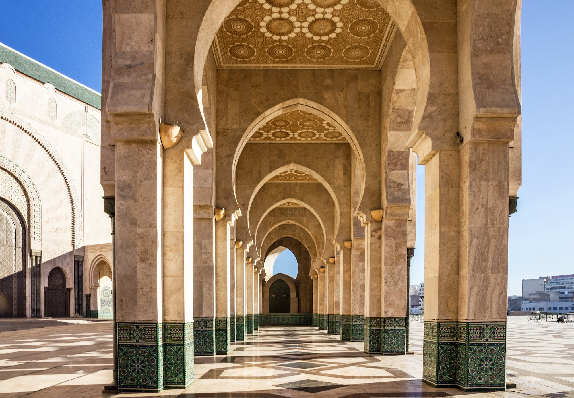 Intricate mosaic tilework and geometric patterns at Hassan II Mosque in Casablanca
