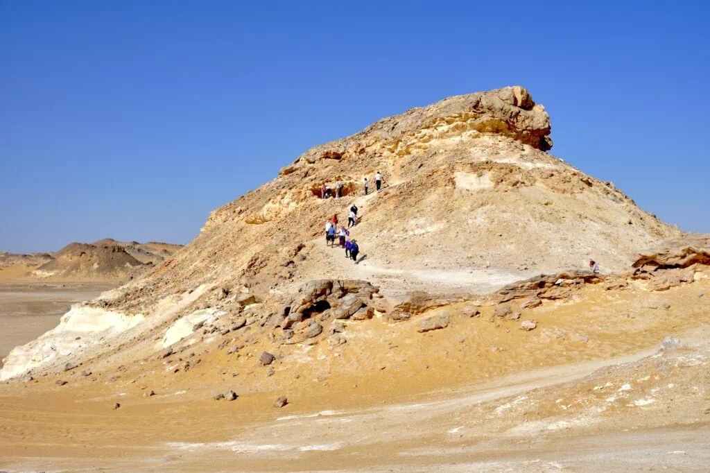 Crystal Mountain Protected Area showing translucent crystal formations rising from desert limestone outcrops, Farafra