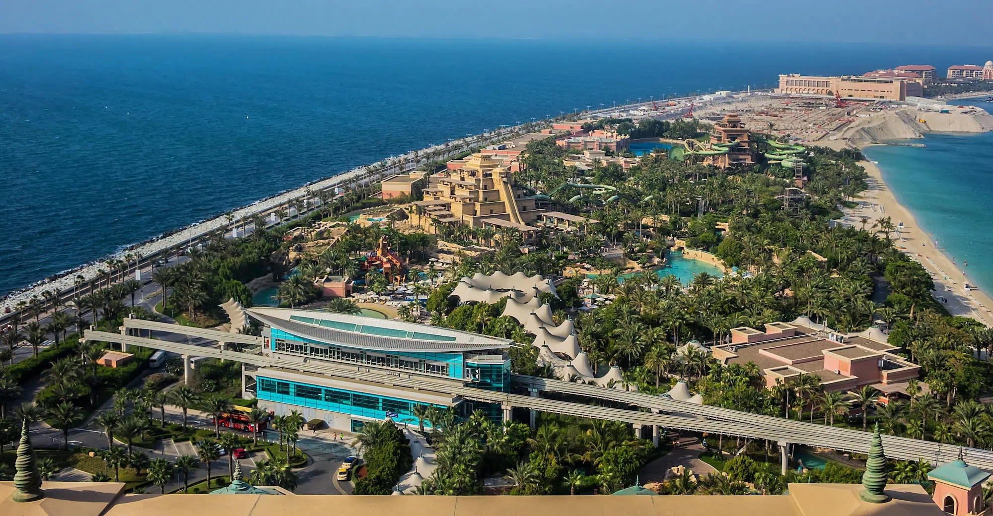 Aerial view of Atlantis hotel and waterpark complex on Palm Jumeirah with monorail and transport access