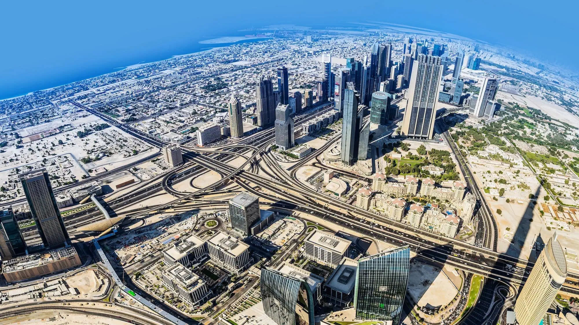 Aerial view of Downtown Dubai showing modern skyscrapers and urban development