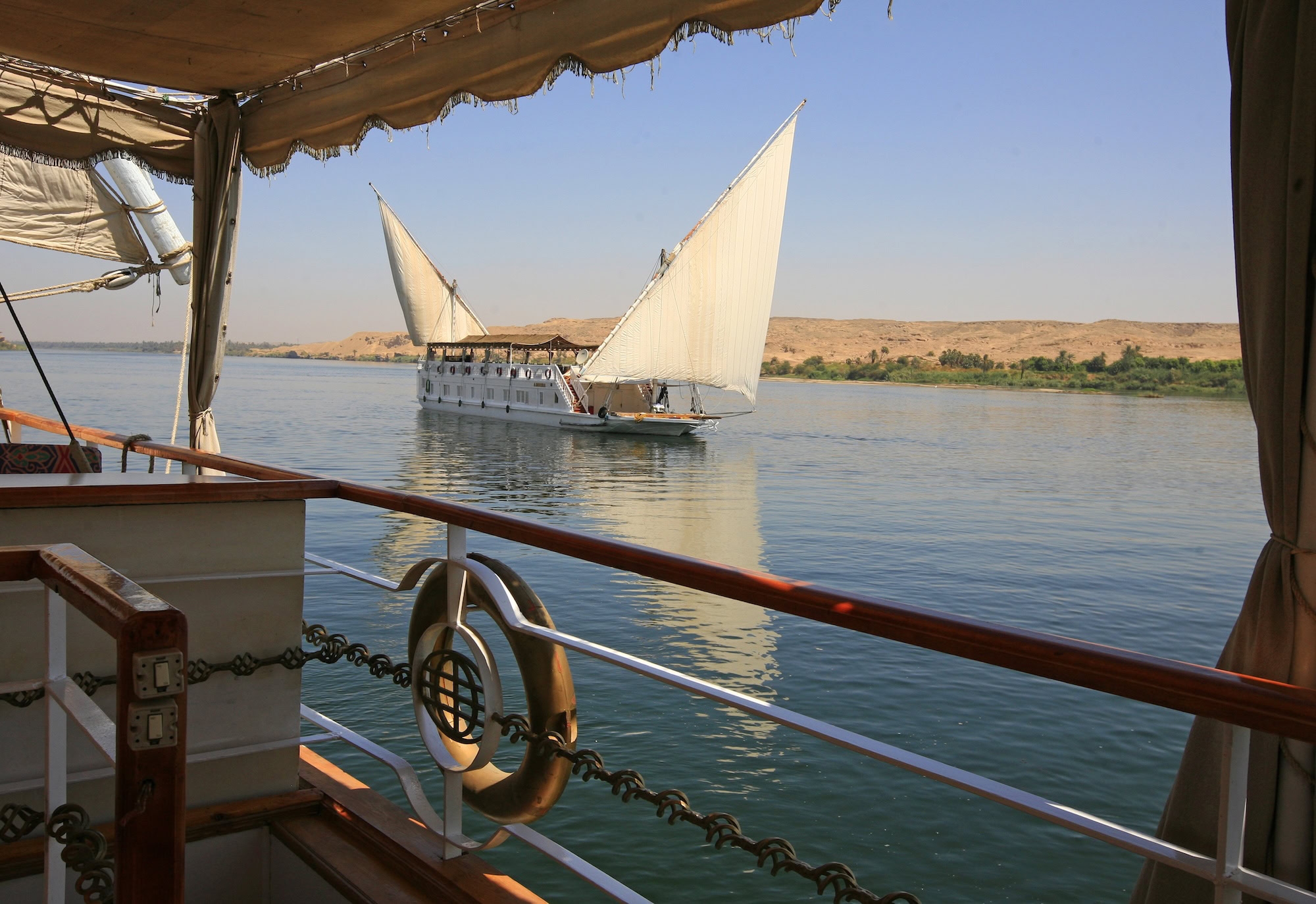 Dahabiya passengers sailing ship on the Nile river Egypt