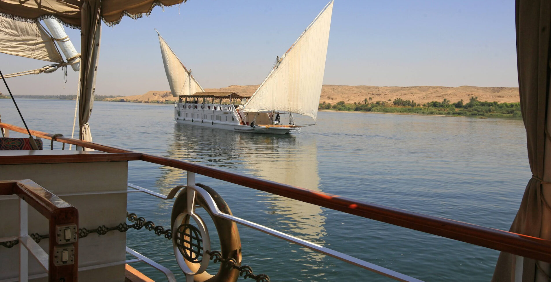 Dahabiya passengers sailing ship on the Nile river Egypt