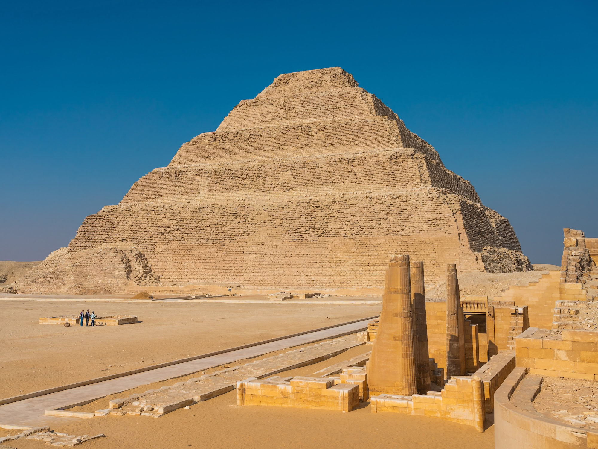 Step Pyramid of Djoser with ancient stone columns and temple complex ruins at Saqqara