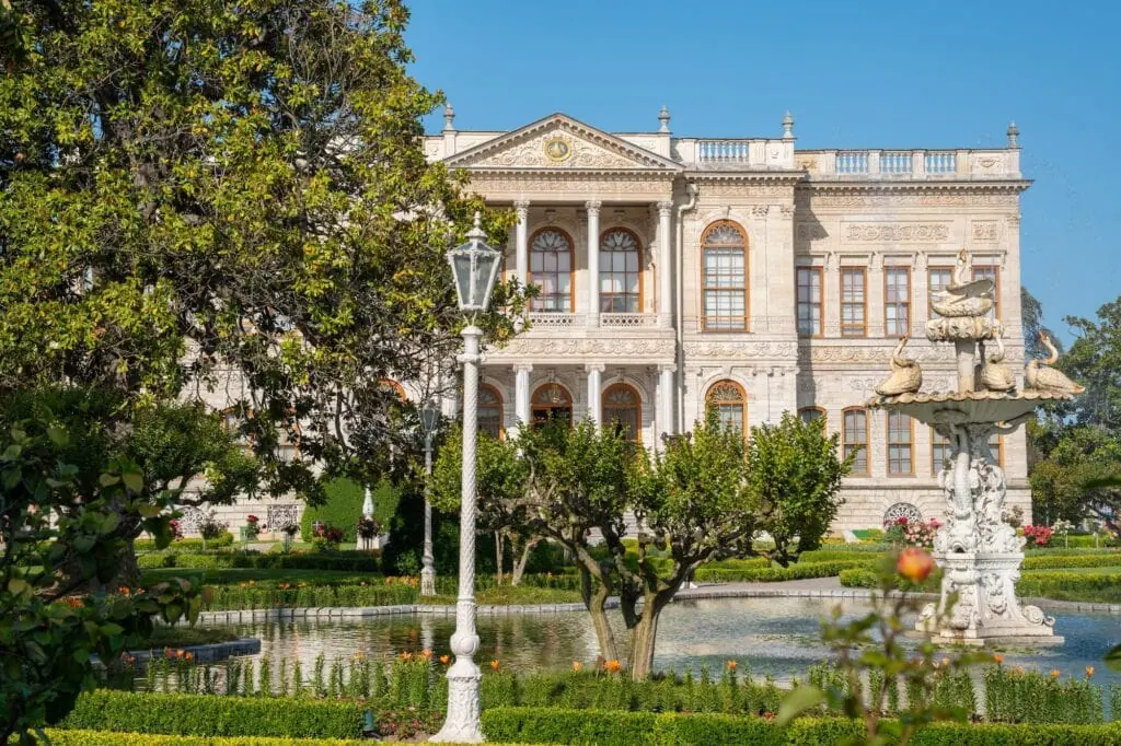 Dolmabahce Palace garden with fountain and roses in foreground Istanbul