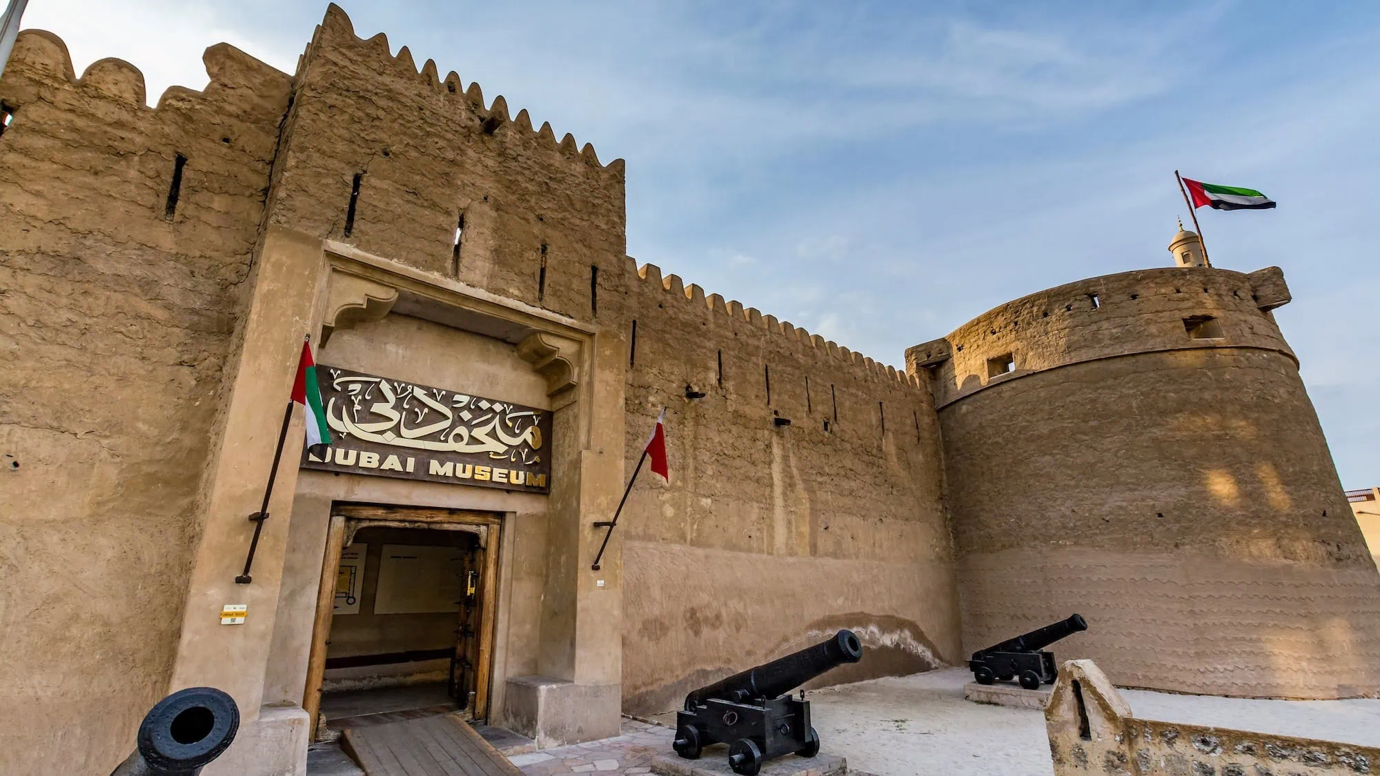 Historic Dubai Museum in Al Fahidi Fort showing traditional Emirati architecture with crenellated walls and courtyard