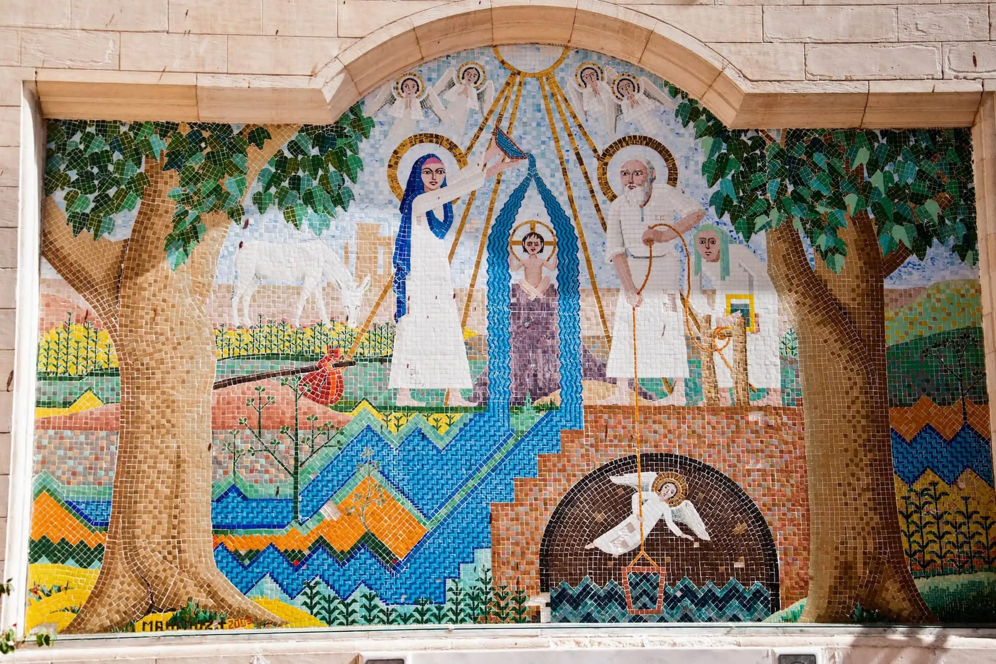 Colorful religious mosaic artwork depicting Christian saints and biblical figures inside The Hanging Church, Cairo