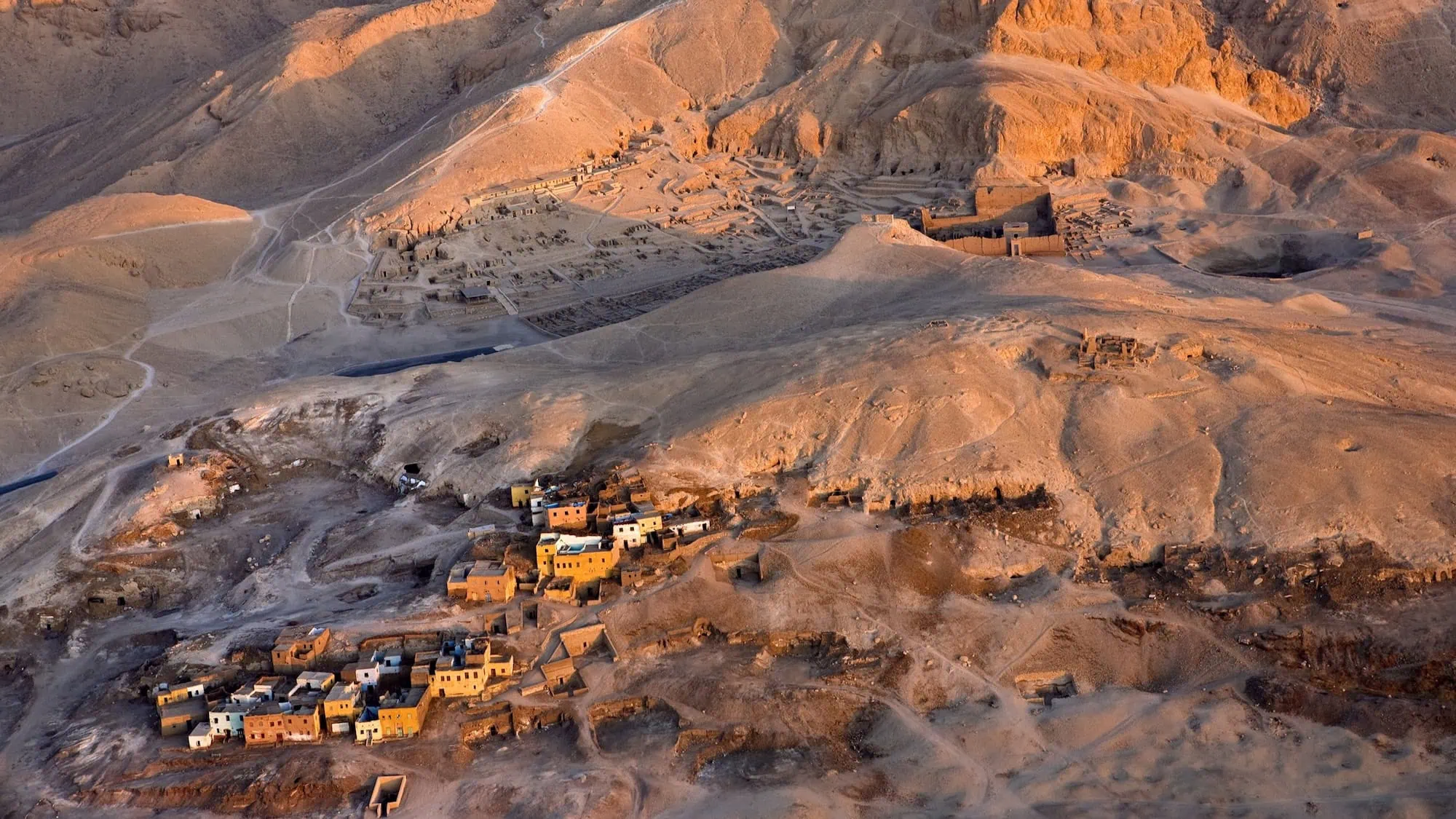 Aerial view of Valley of the Kings archaeological site with desert landscape and excavation areas