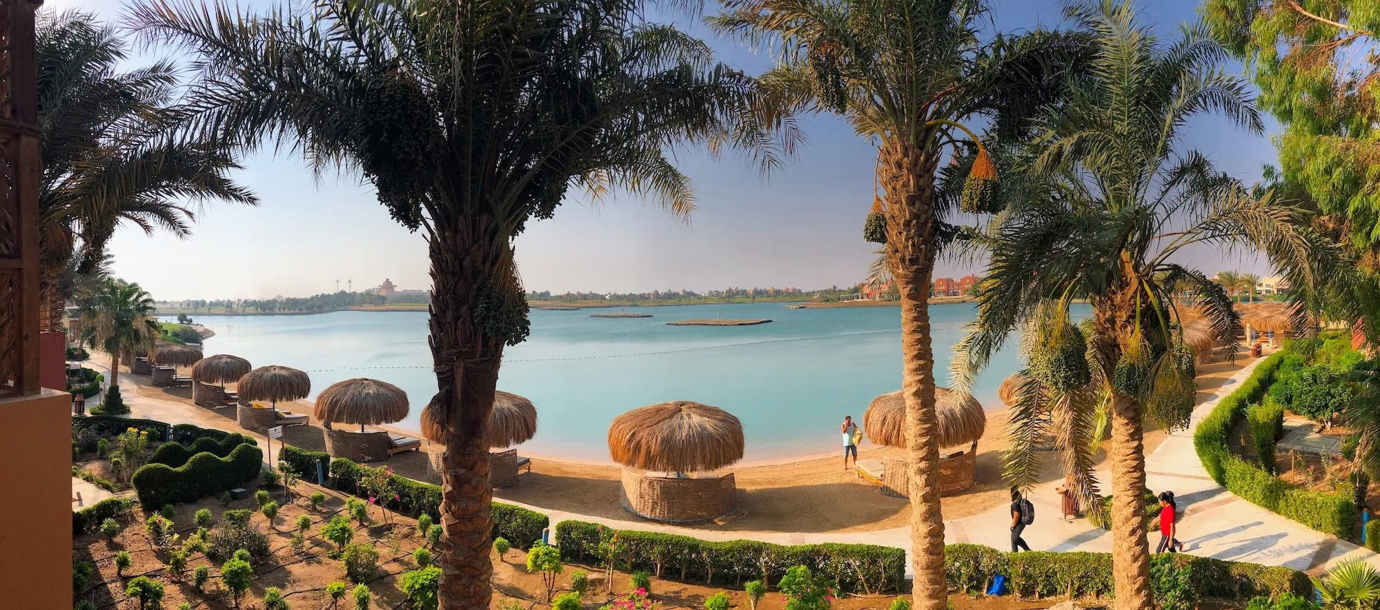 Luxury resort in El Gouna with turquoise lagoon, palm trees, and upscale waterfront accommodations