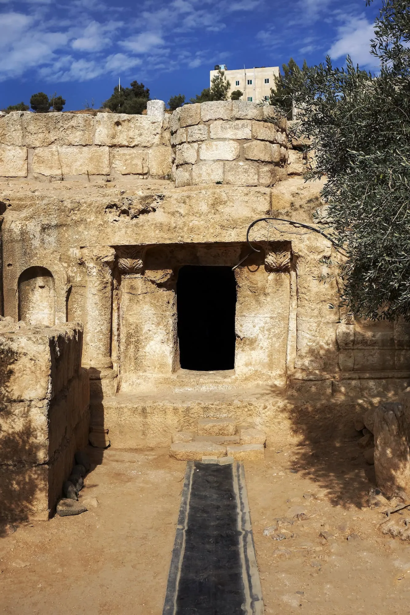 Ancient stone entrance to Cave of the Seven Sleepers in Amman, Jordan