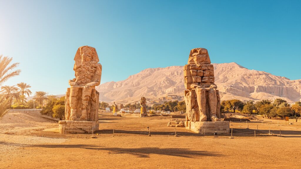 The famous Colossi of Memnon, statues of Amenhotep III near Luxor, Egypt