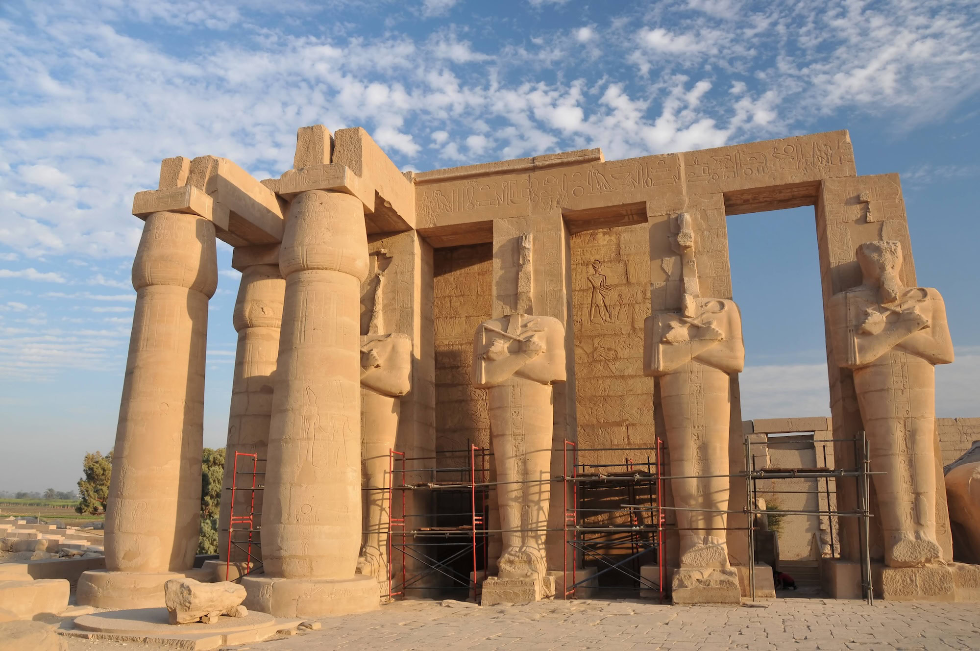 Ramesseum Temple in Egypt showing scaffolding and restoration work on ancient columns