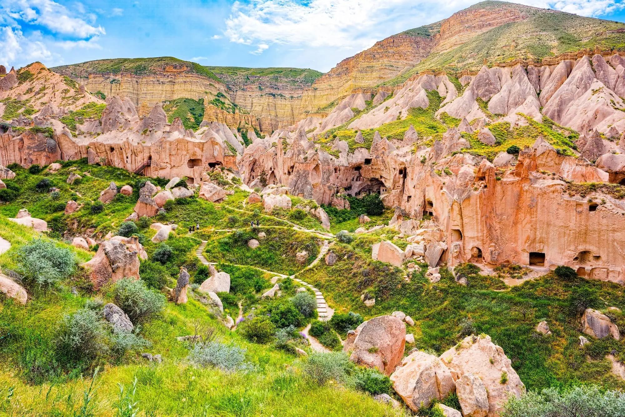 Fairy chimney rock formations and ancient cave dwellings at Zelve Open Air Museum in Cappadocia