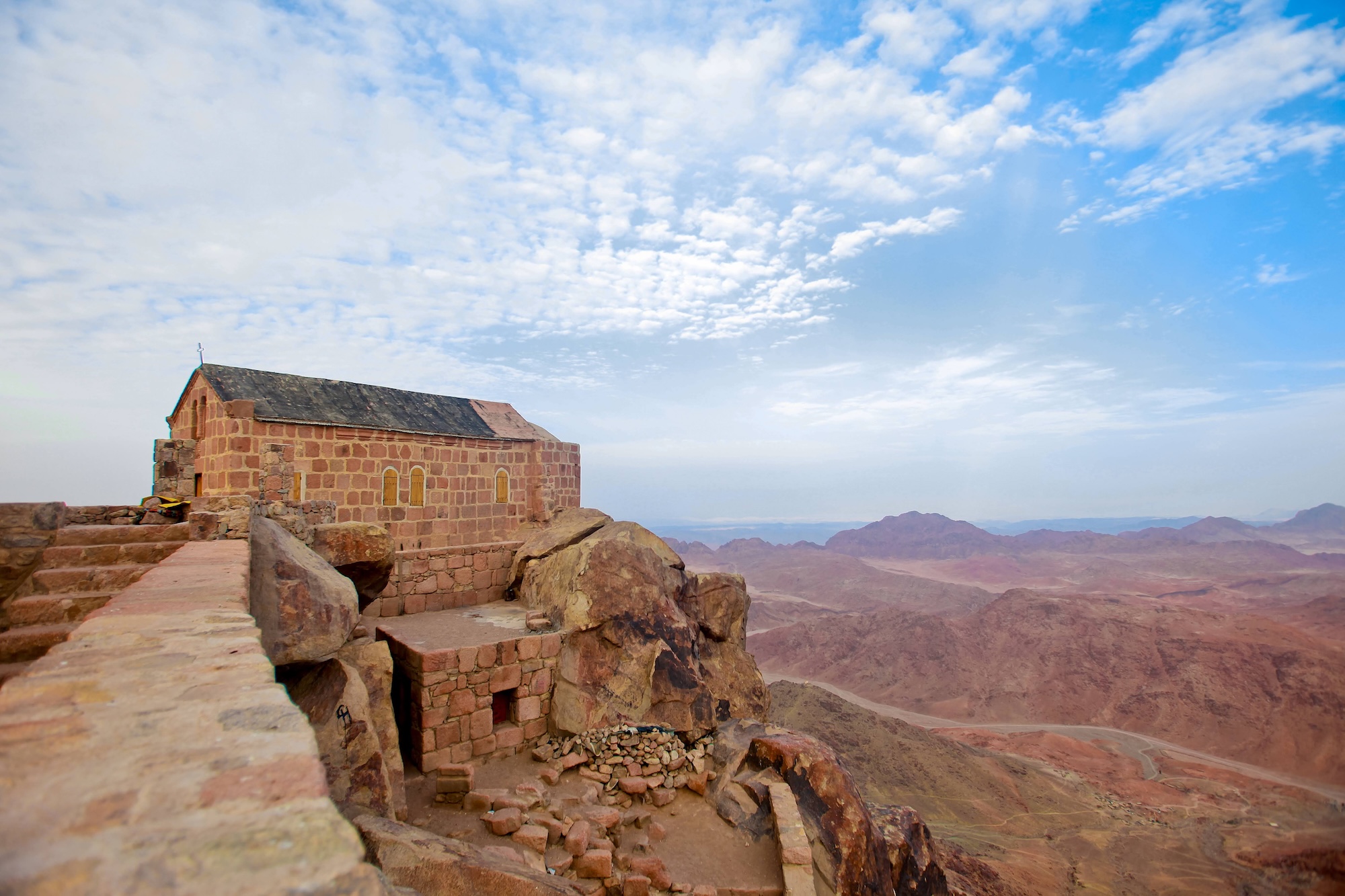 Stone chapel on Mount Sinai with mountains and rocky terrain