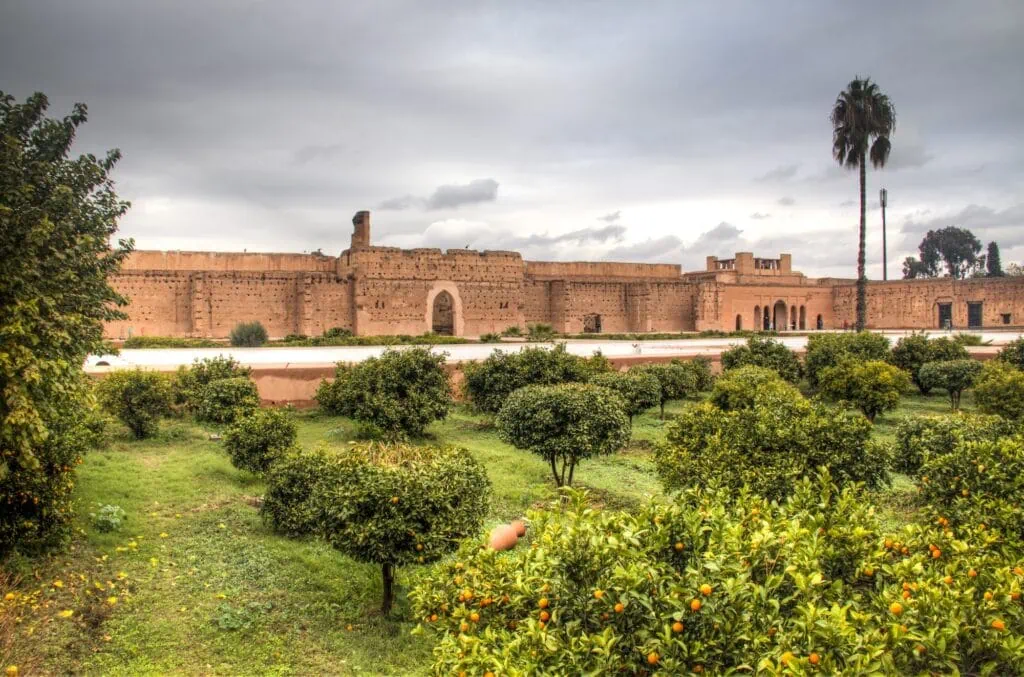 Bab Agnaou interior passage with stone arches, decorative carvings, and enclosed courtyard space Marrakech