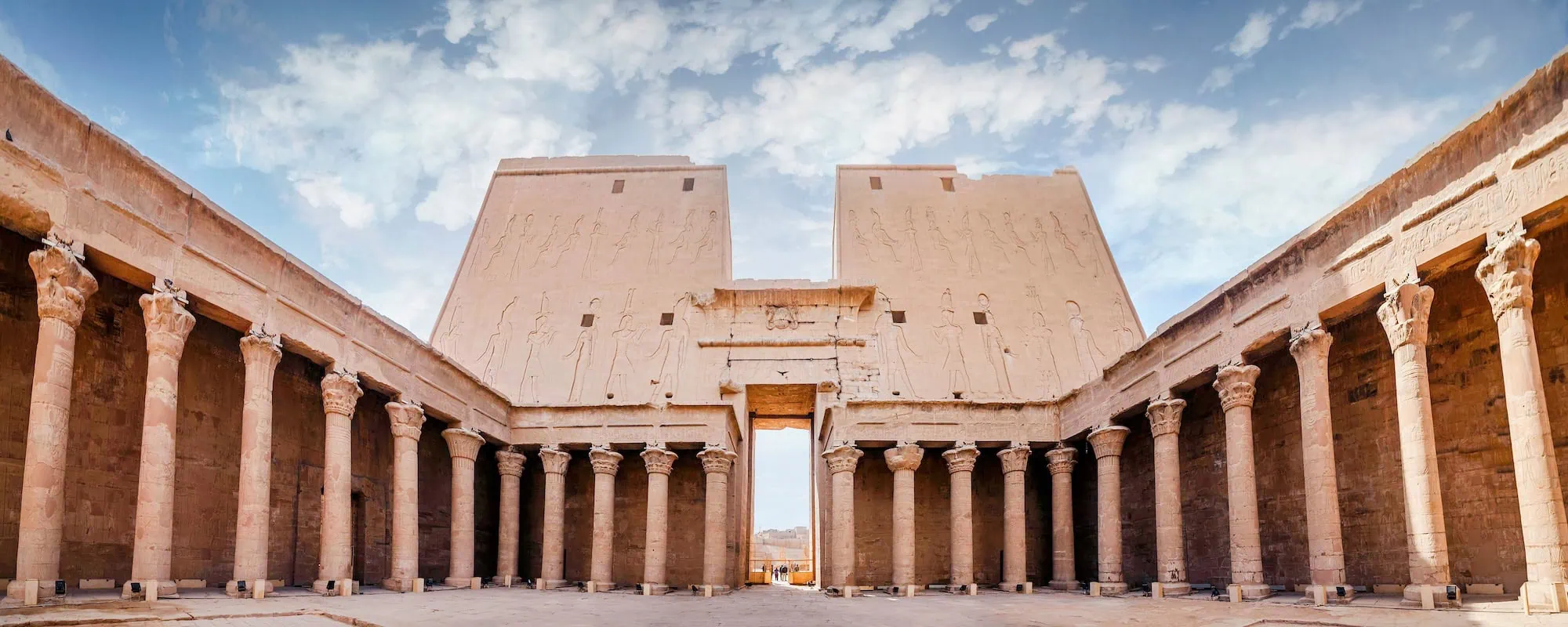 Majestic columns and entrance of the ancient Temple of Edfu in Egypt