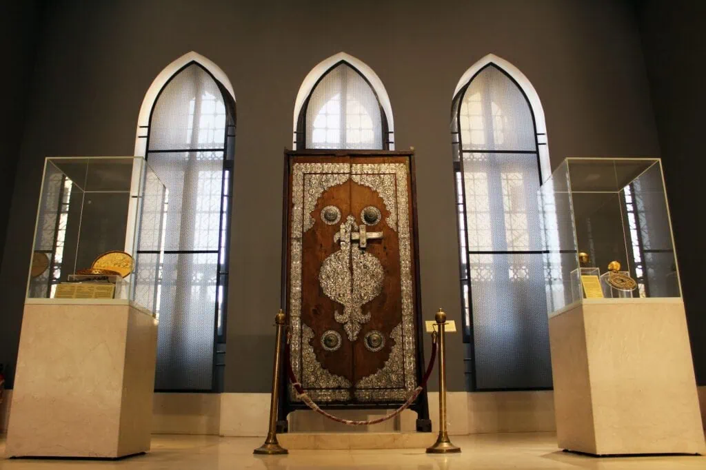 Islamic carpet displayed inside a glass exhibition case at the Museum of Islamic Art, Cairo