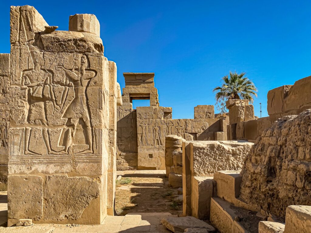 Ruins and reliefs inside the Temple of Mut at Karnak
