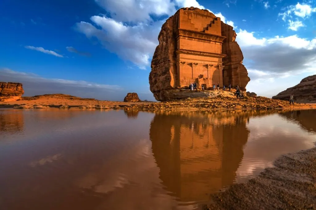 A Nabataean rock-cut tomb facade at Hegra (Madain Salih) archaeological site in AlUla, Saudi Arabia — UNESCO World Heritage Site since 2008, with 111 monumental tombs carved into sandstone outcrops between the 1st century BC and 1st century AD
