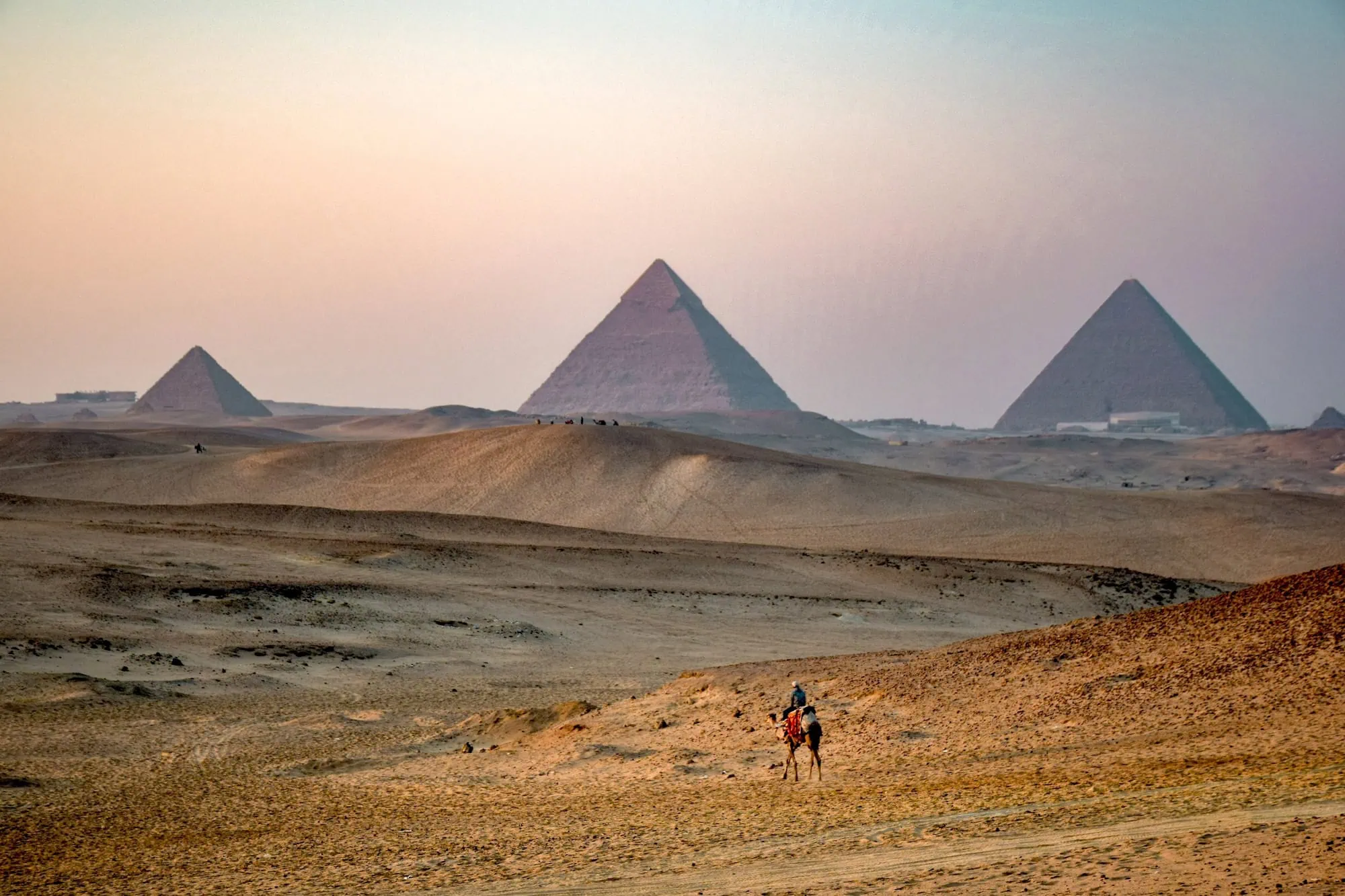 An evening view of the pyramids of Giza against the skyline, Giza
