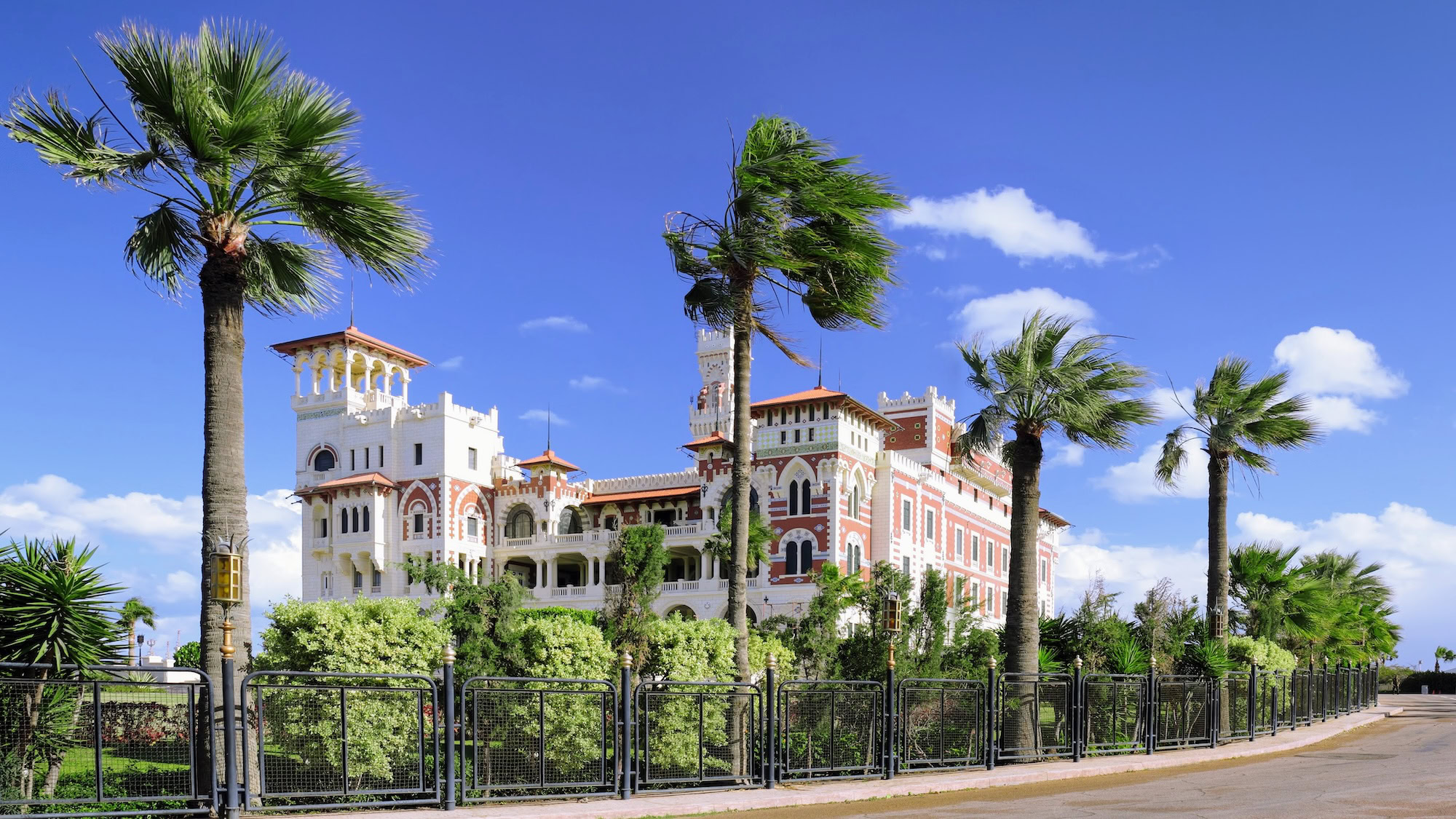 Serene Montaza Palace in Alexandria with palm trees and gardens