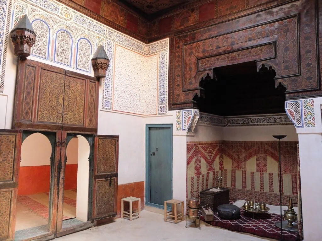Museum of Mouassine Douiria Derb el Hammam interior showing traditional riad courtyard with tiled floor, carved wood, and central fountain Marrakech