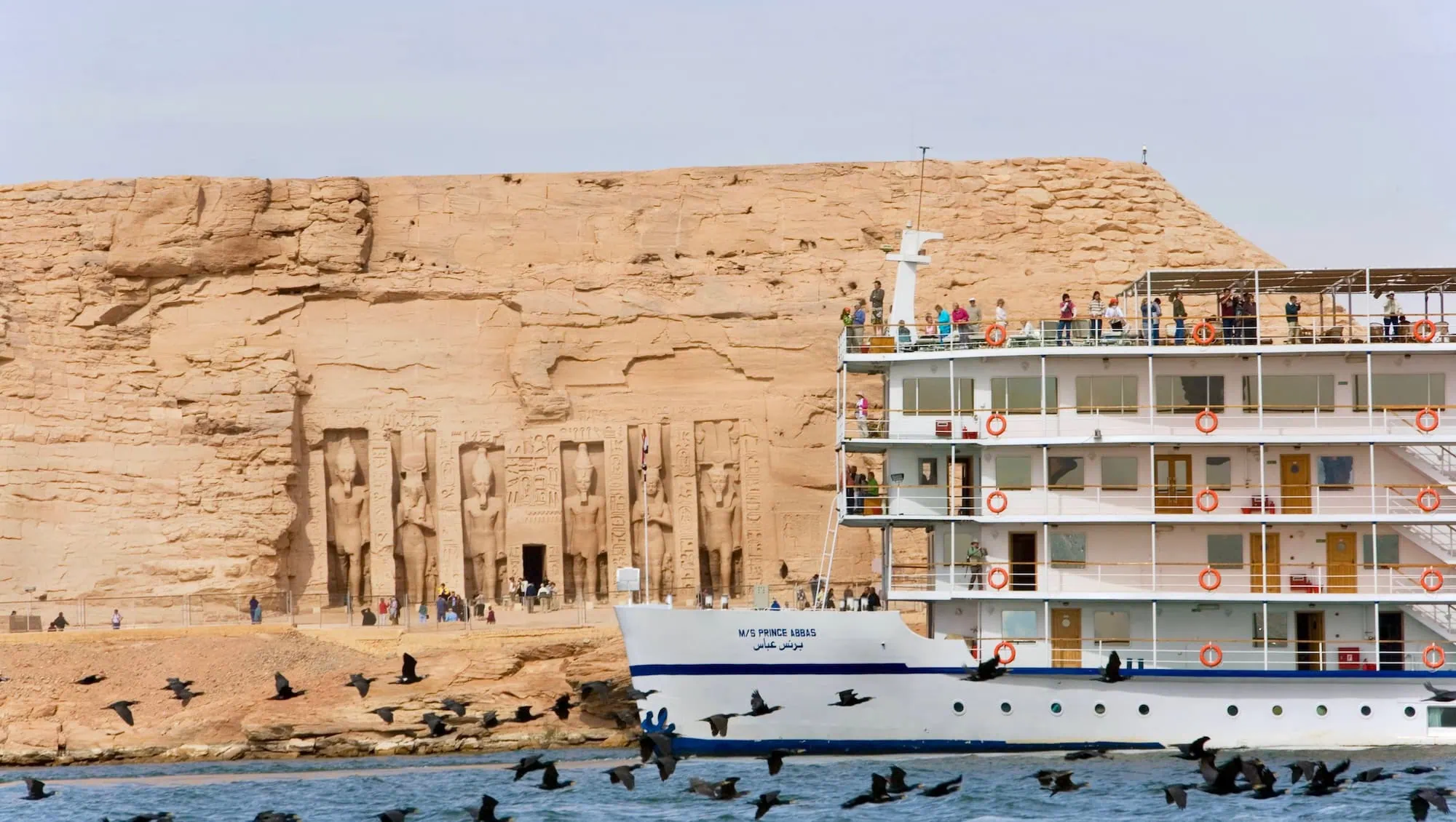 Abu Simbel temple with Nile cruise ship anchored at Lake Nasser