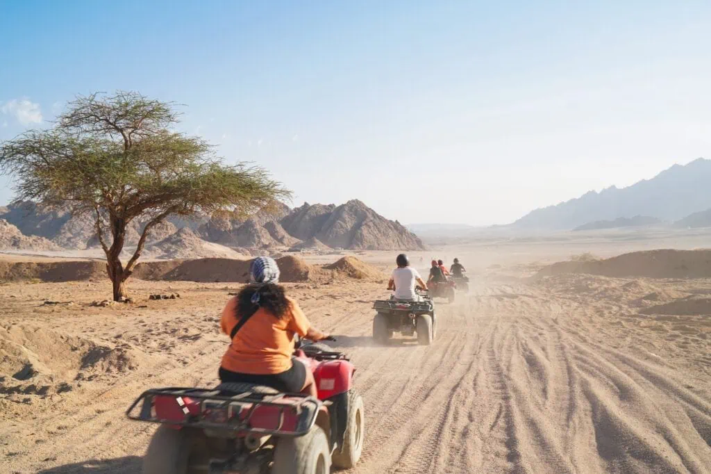 Quad bike riding across desert terrain near Hurghada, Hurghada