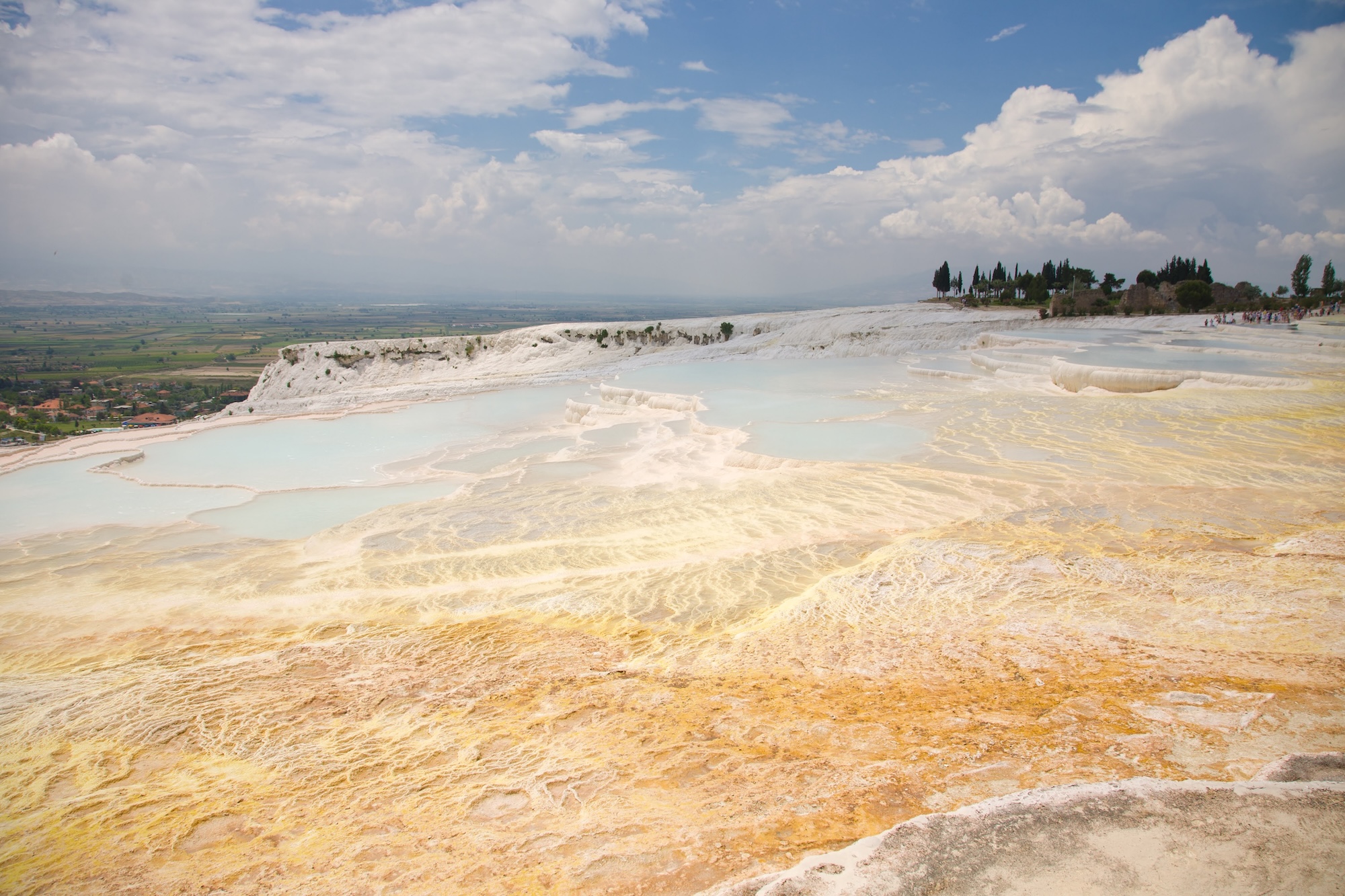 White travertine terraces of Pamukkale with thermal pools and limestone formations
