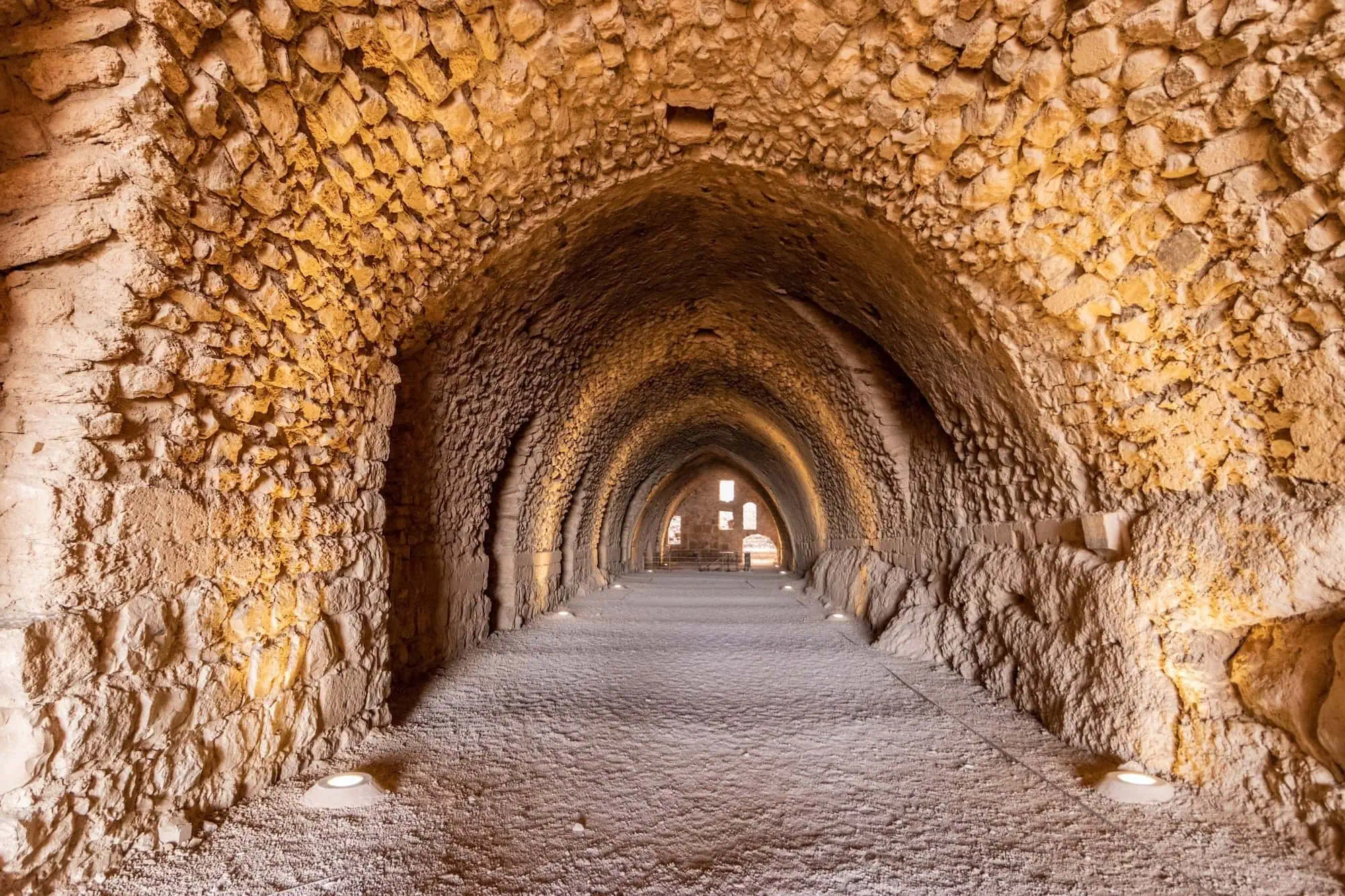 Stone arched corridor interior of Karak castle showing Mamluk architectural elements