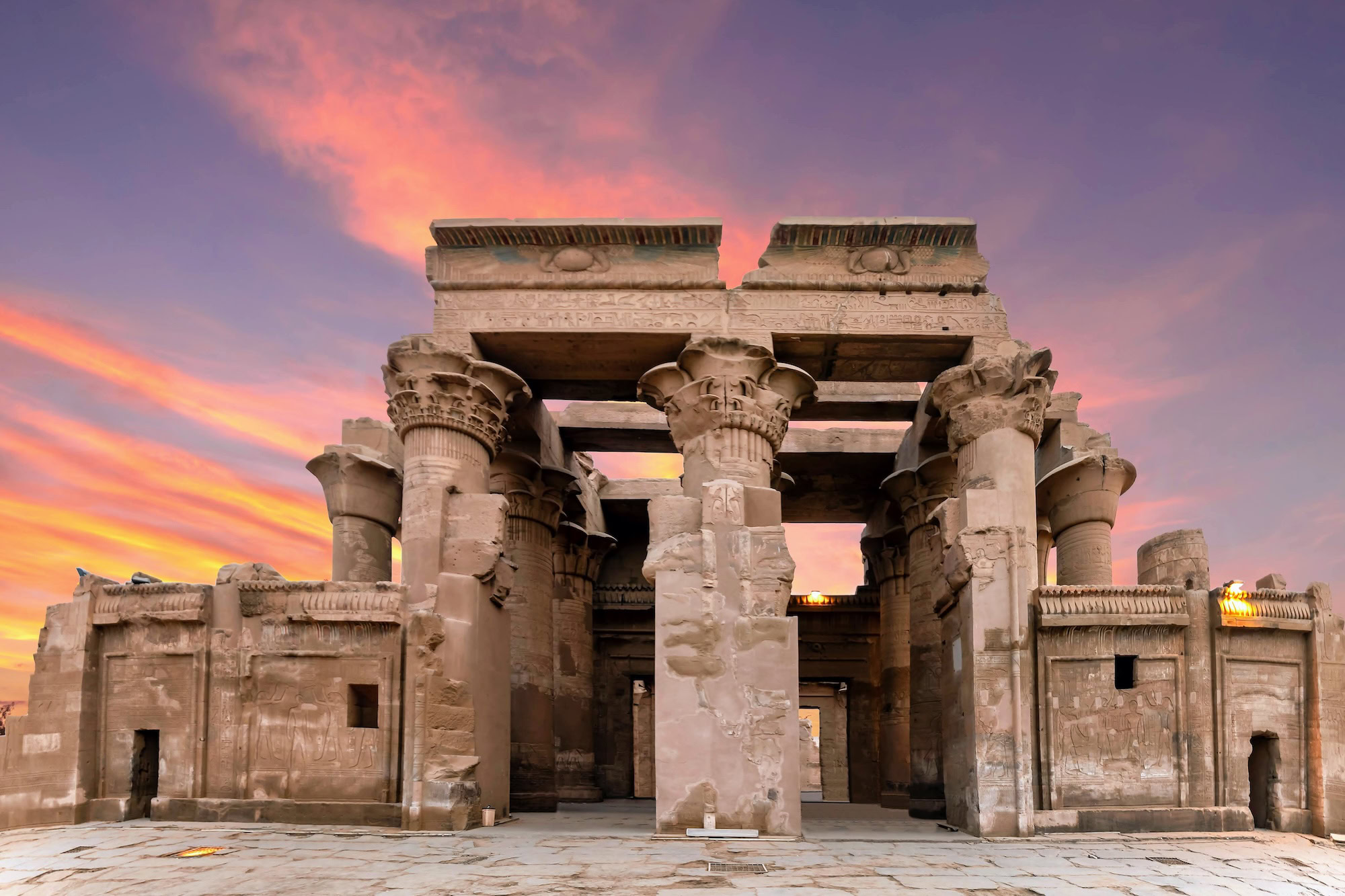 Ancient Kom Ombo Temple courtyard showing twin temple complex with columns and hieroglyphic carvings