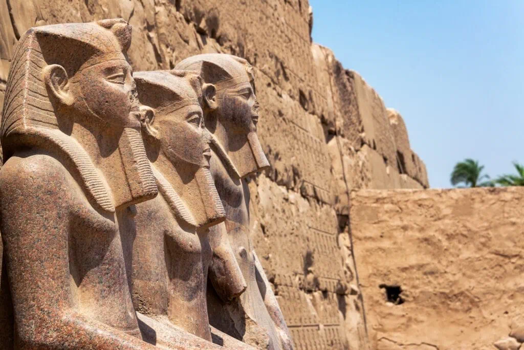 States Of Three Pharaohs In Karnak Temple In Luxor