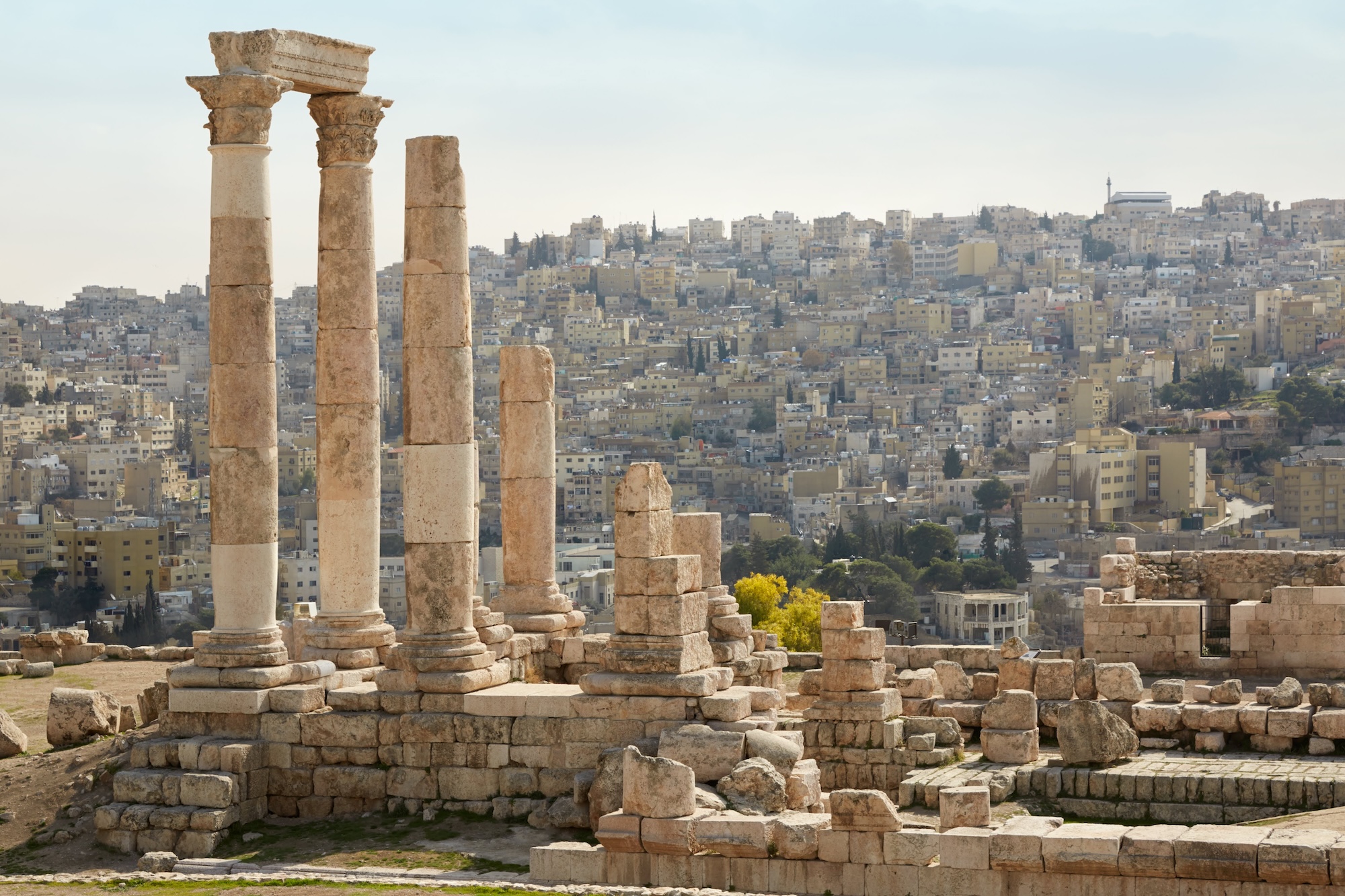 Ancient Roman temple ruins overlooking the modern city of Amman, Jordan