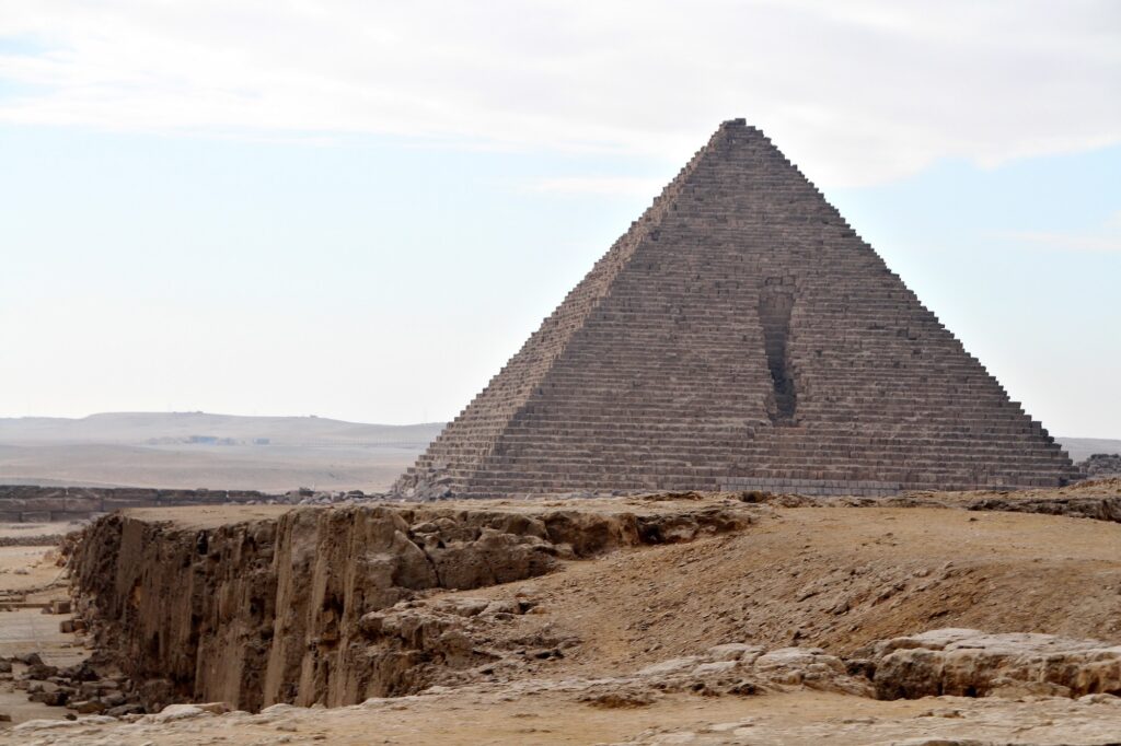 The Great Pyramid of Giza, (also known as the Pyramid of Khufu or the Pyramid of Cheops), located near Cairo