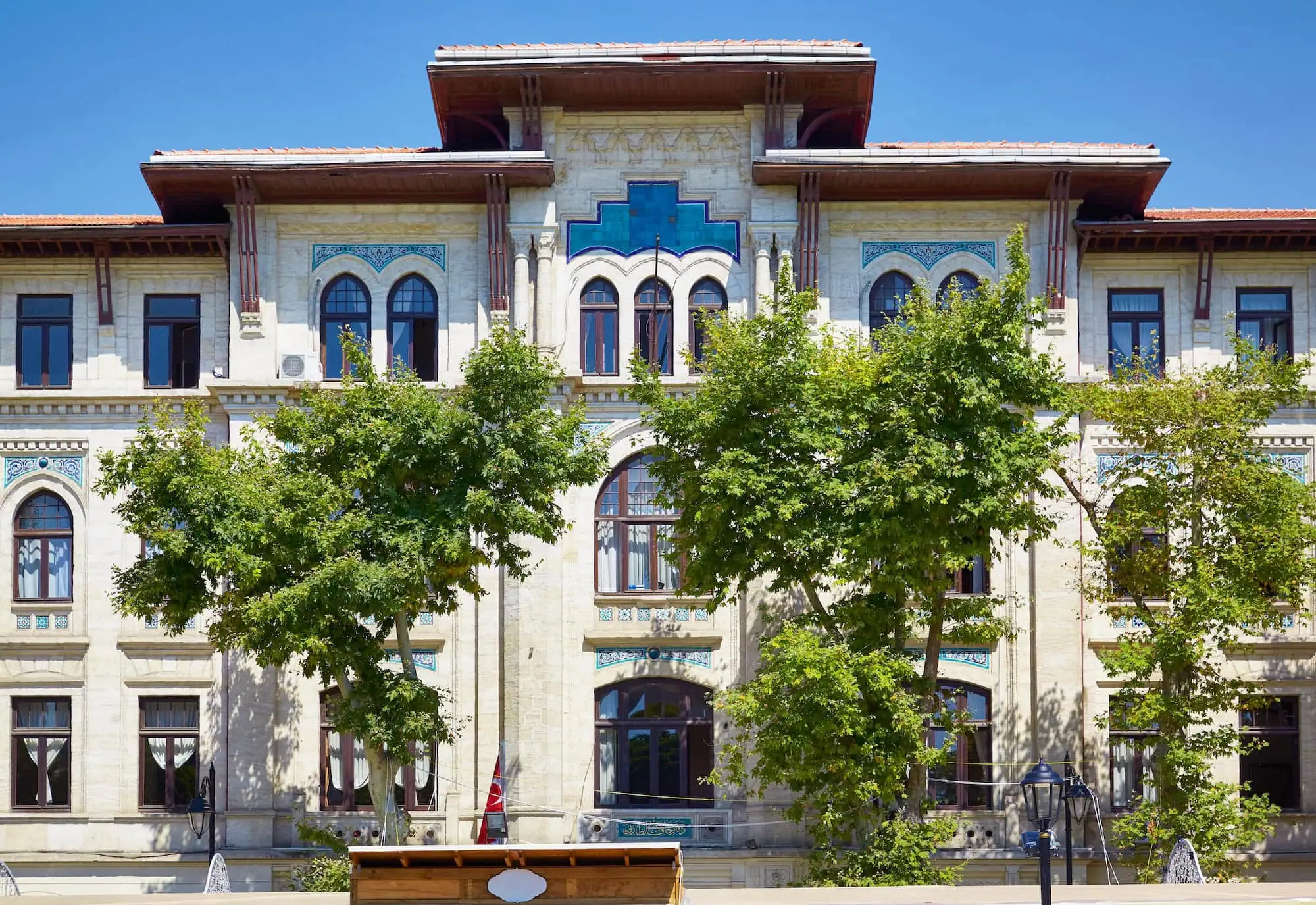 Turkish and Islamic Arts Museum exterior with Ottoman architecture and Turkish flag