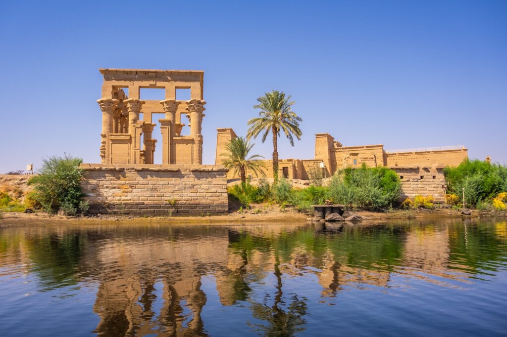 The beautiful Temple of Philae in Aswan, Egypt – island sanctuary dedicated to the goddess Isis, featured on Egypt tours from Boston.