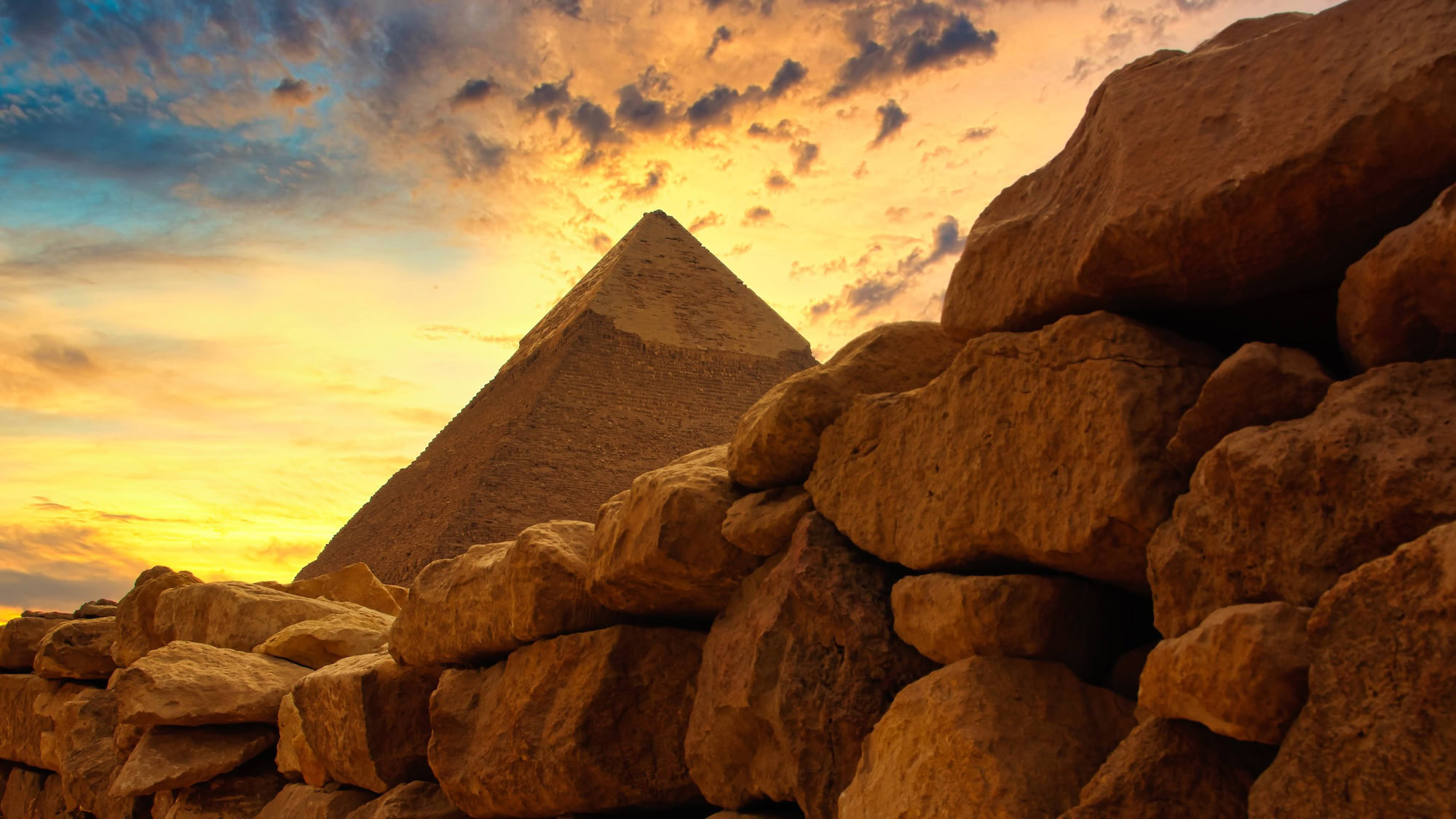 Close-up view of the Great Pyramid of Giza showing massive limestone blocks and ancient construction