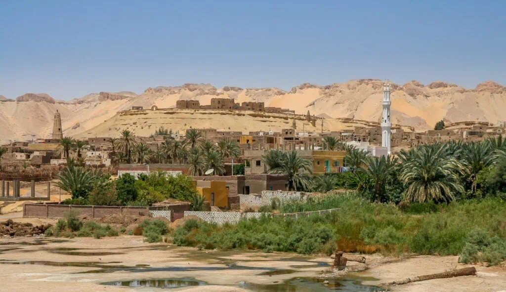 Mudbrick houses, narrow alleys, and fortified walls of the Islamic town of Al Qasr at Dakhla Oasis, Dakhla