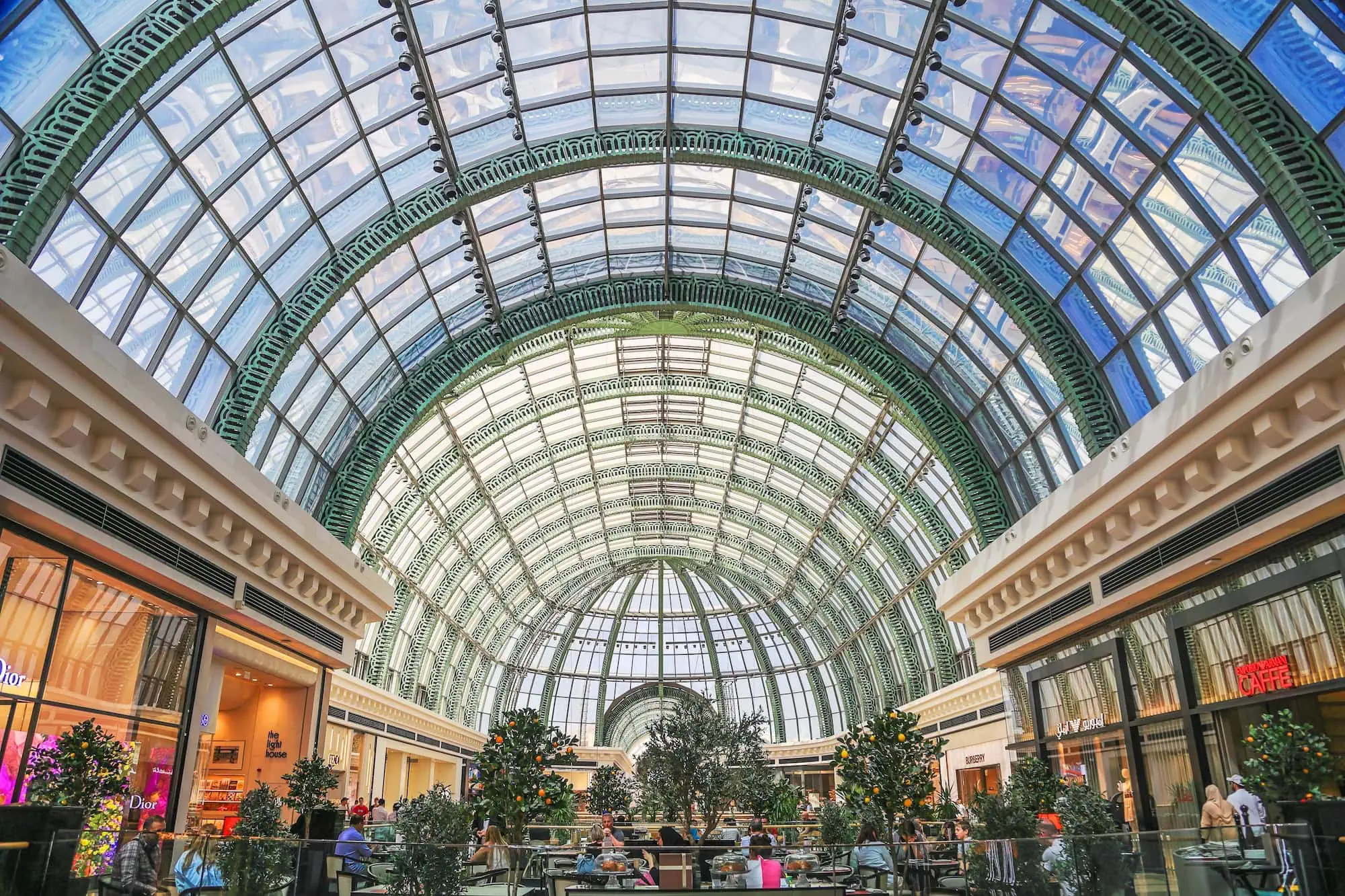 Interior view of Mall of the Emirates showing glass barrel vault ceiling and shopping areas